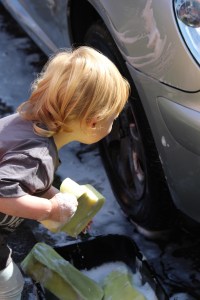 Bella washing a car