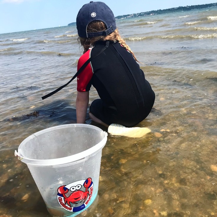 Leaping into the sea at Lepe Beach