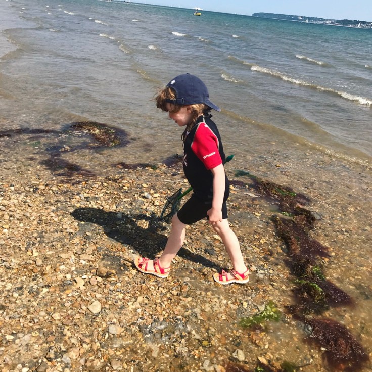 Leaping into the sea at Lepe Beach